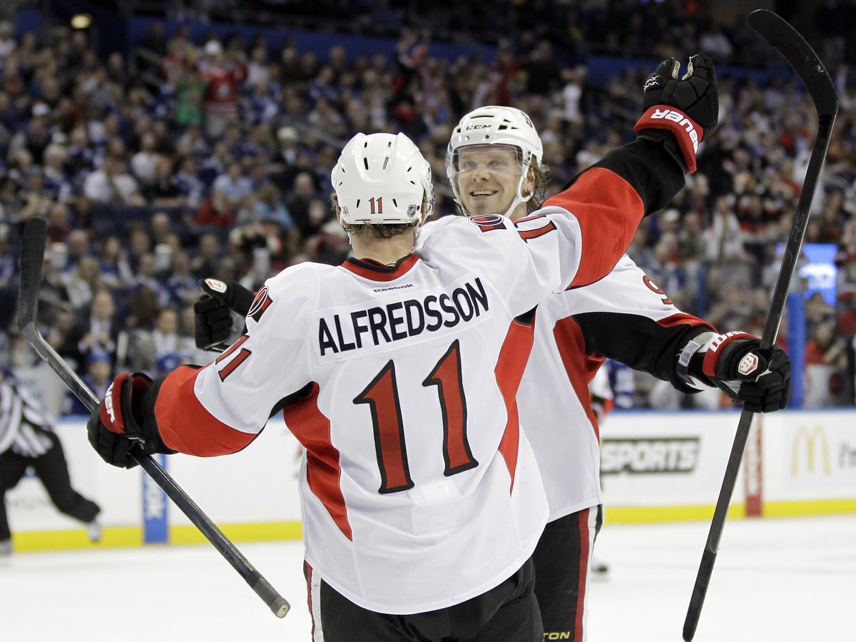 Daniel Alfredsson a Milan Michálek