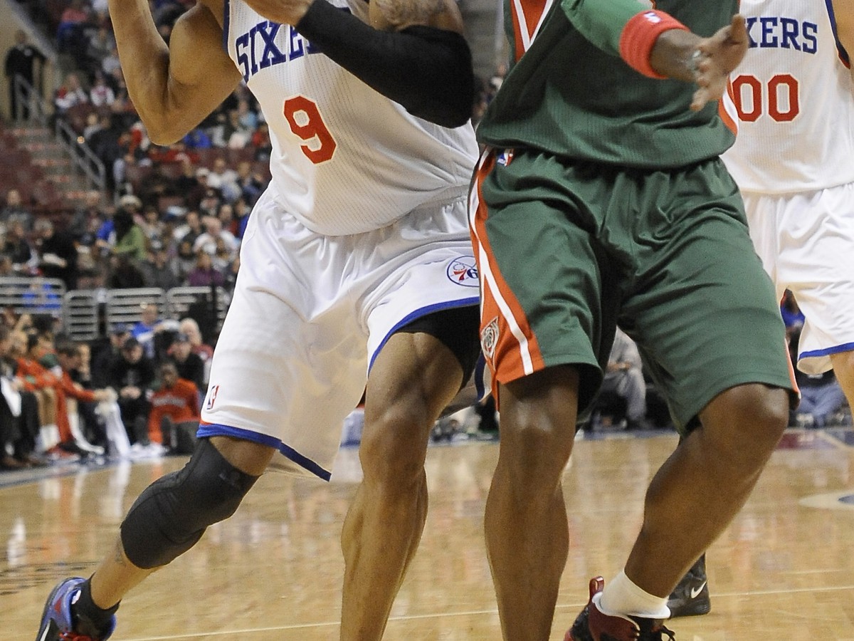 Andre Iguodala (9) a Stephen Jackson