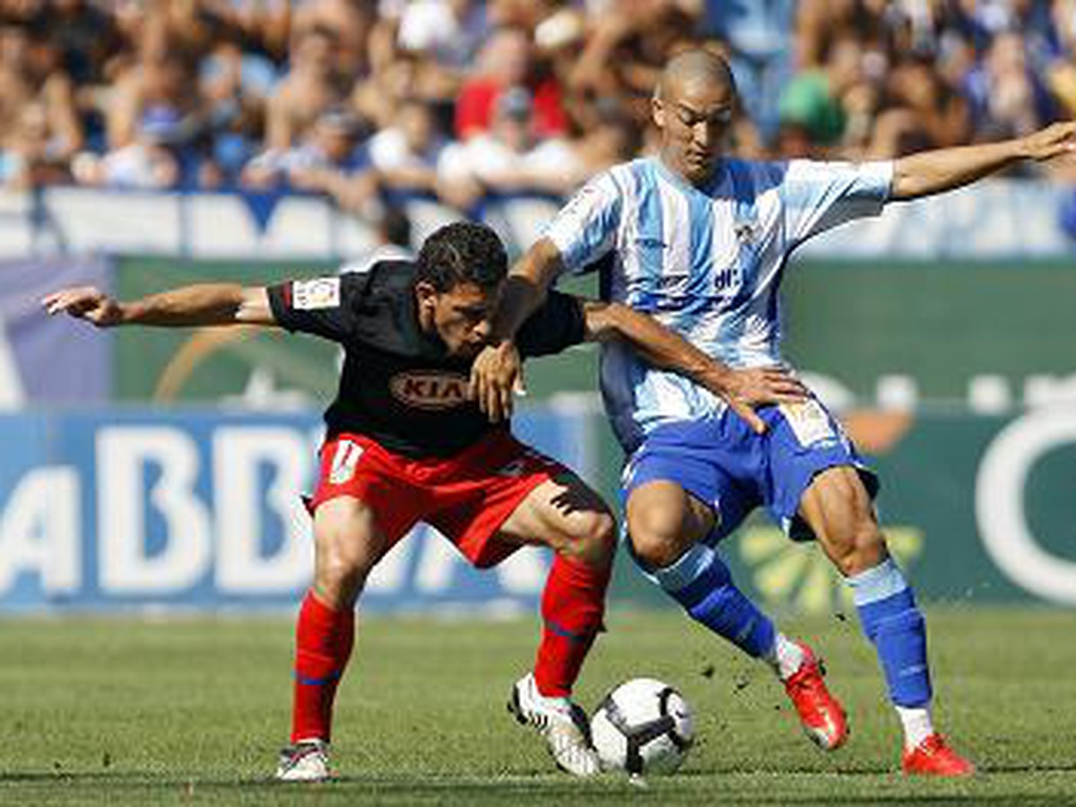 Maxi Rodriguez bojuje s Nabilom Bahom