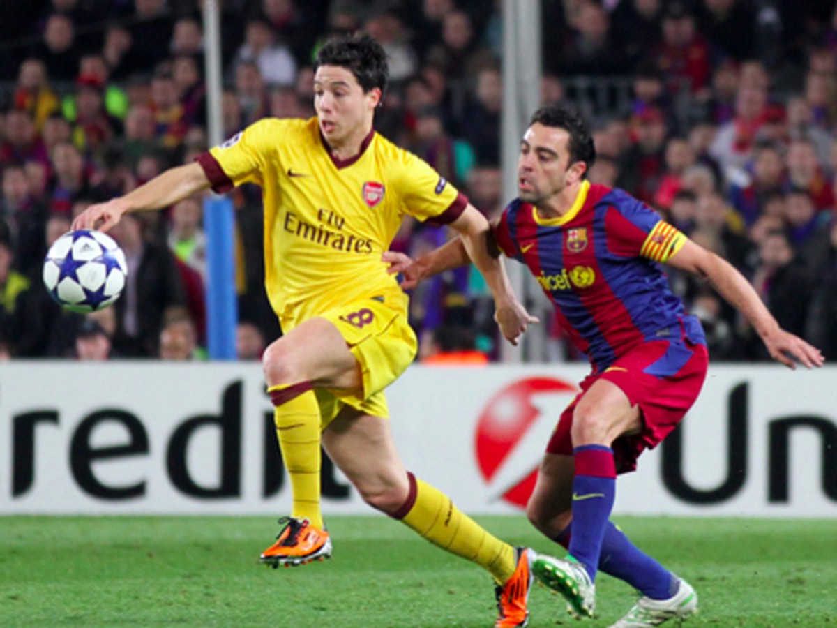 Samir Nasri a Xavi Hernandez