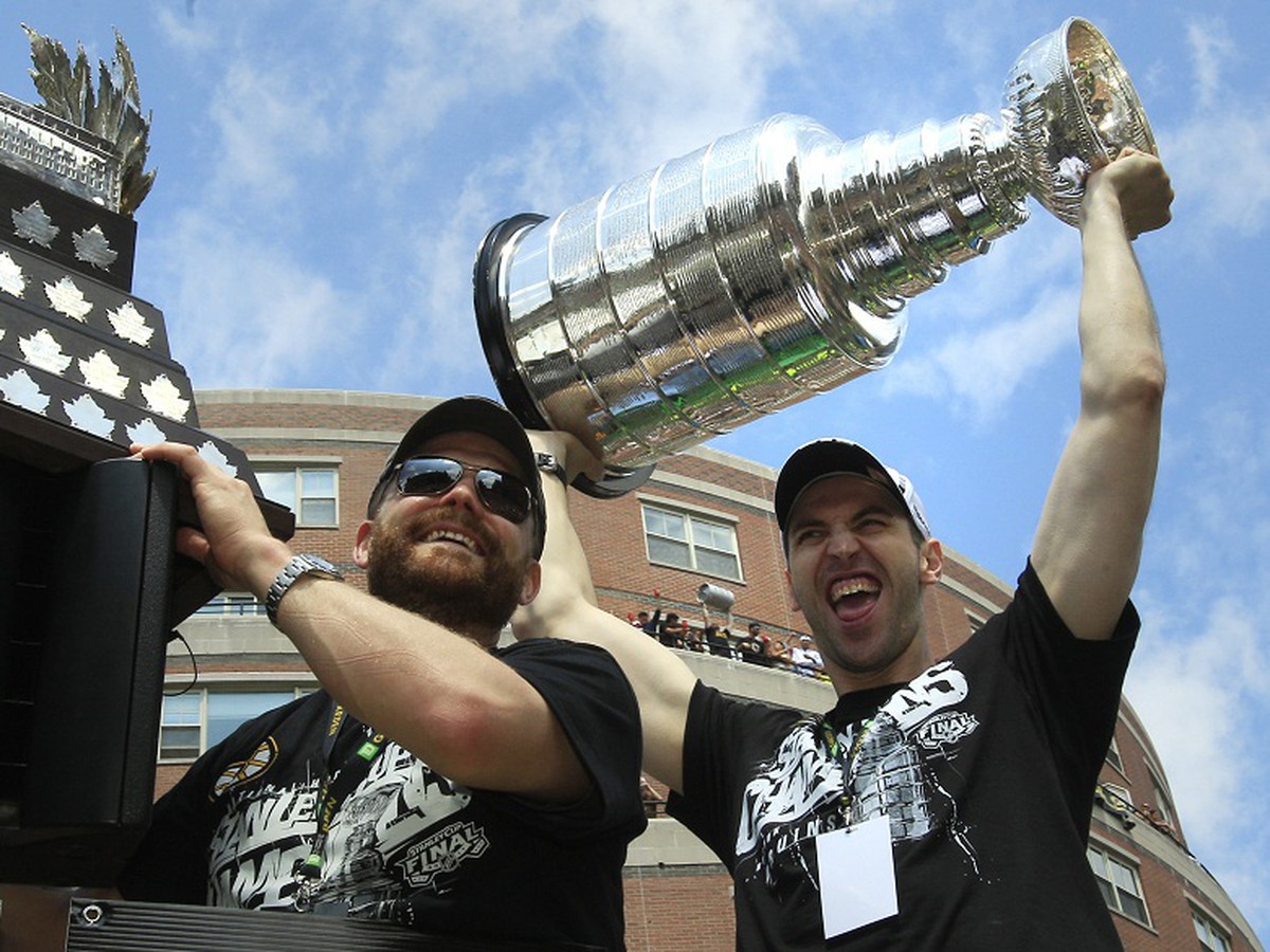 Zdeno Chára a Tim Thomas