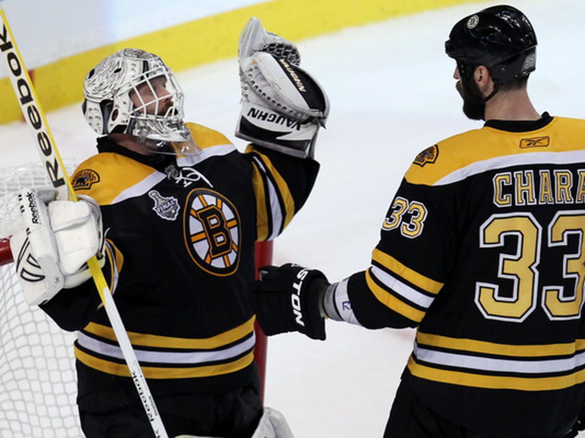 Zdeno Chára a Tim Thomas