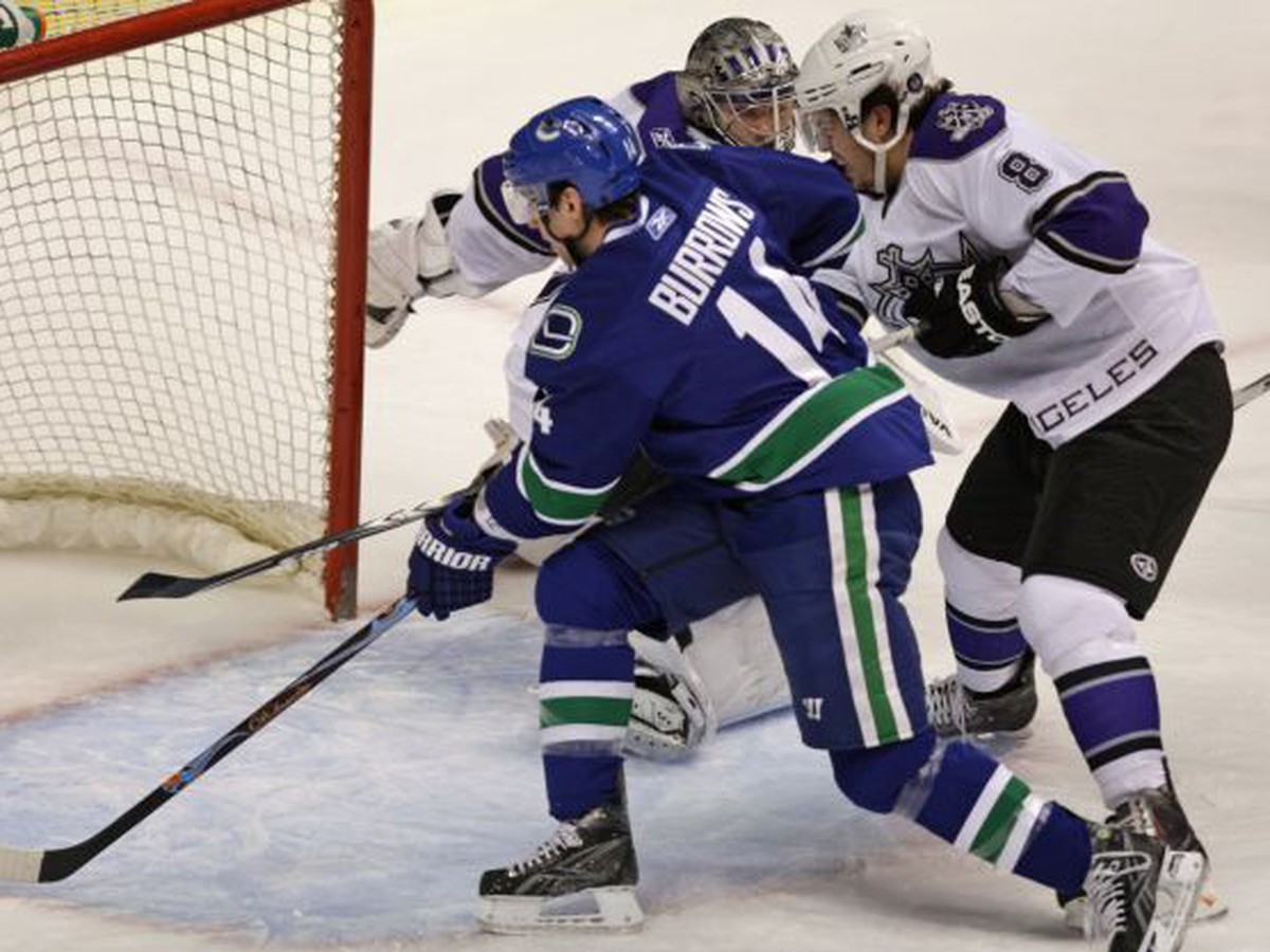 Alex Burrows práve prekonáva Quicka