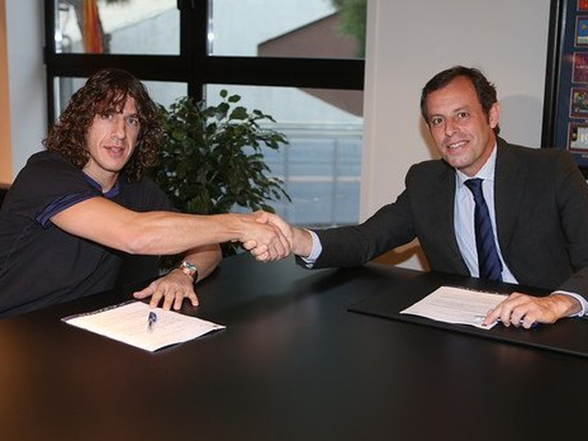 Carles Puyol a prezident Barcelony Sandro Rosell