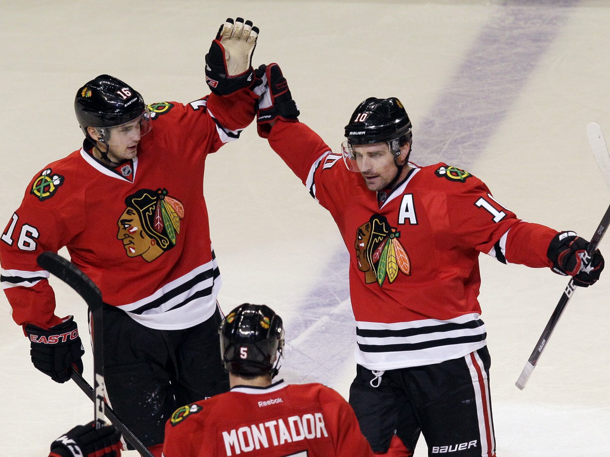 Marcus Kruger, Patrick Sharp a Steve Montador
