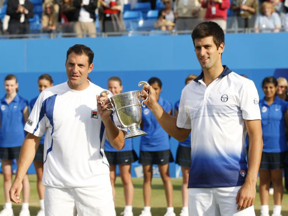 Erlich a Djokovič s trofejou za víťazstvo