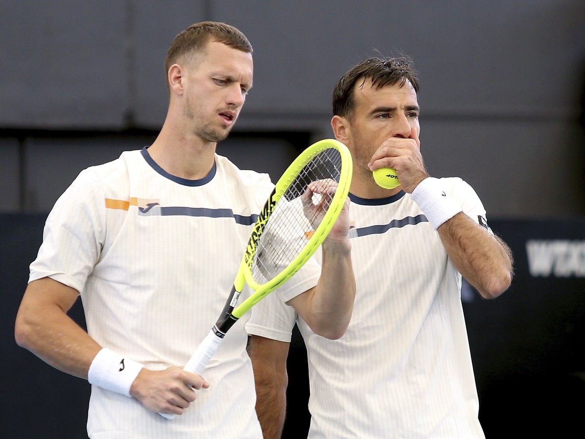 Slovenský tenista Filip Polášek a Chorvát Ivan Dodig