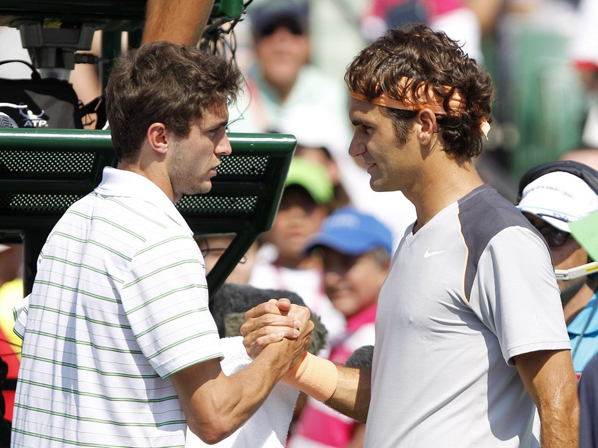 Gilles Simon a Roger Federer