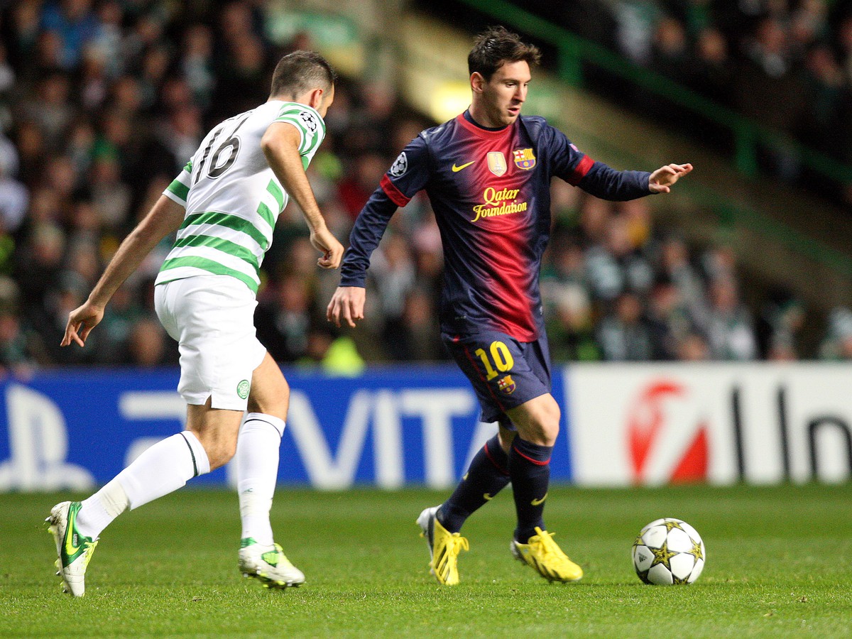 Lionel Messi a Joe Ledley