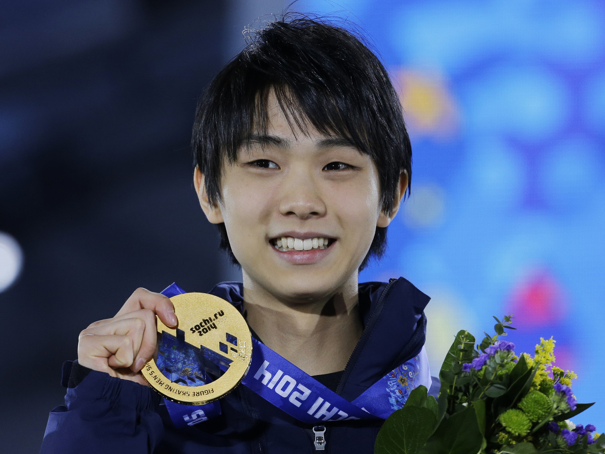 Juzuru Hanju so zlatou olympijskou medailou v Soči