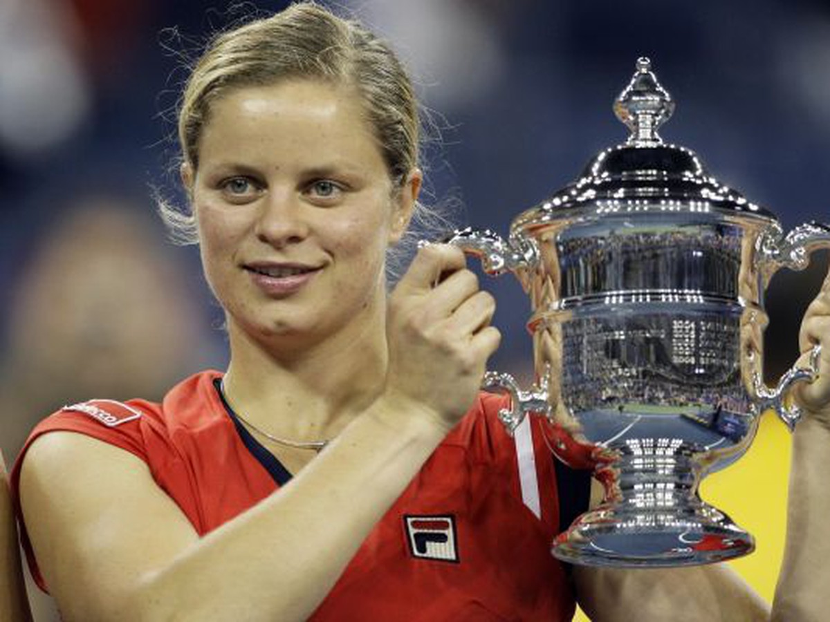 Kim Clijsters drží trofej po víťazstve finále US Open