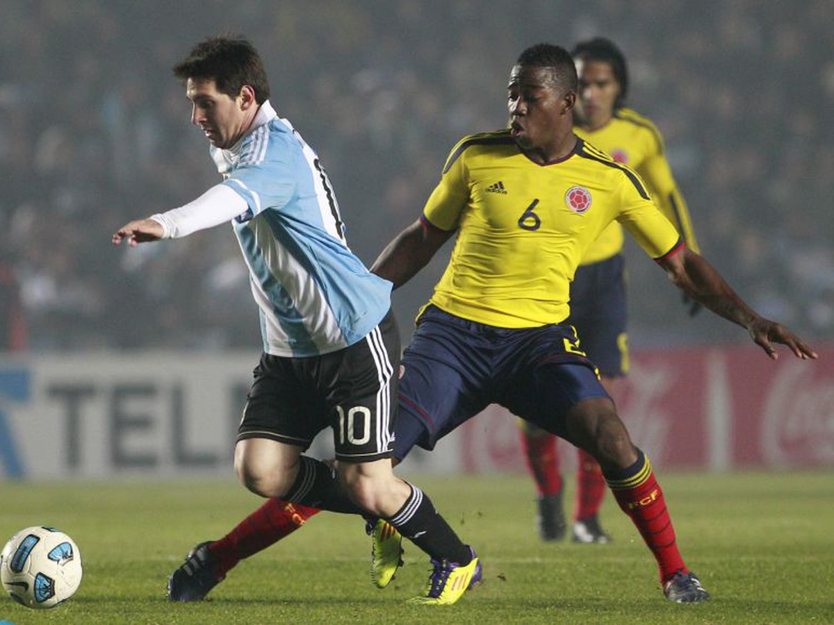 Lionel Messi a Carlos Sanchez
