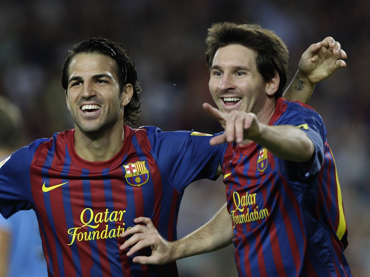 Lionel Messi a Cesc Fabregas po góle