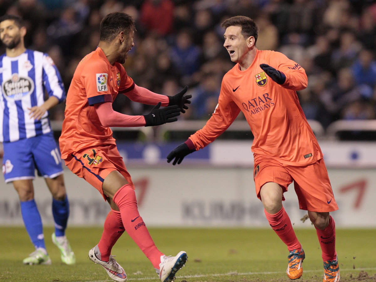 Neymar a Lionel Messi sa radujú z gólu