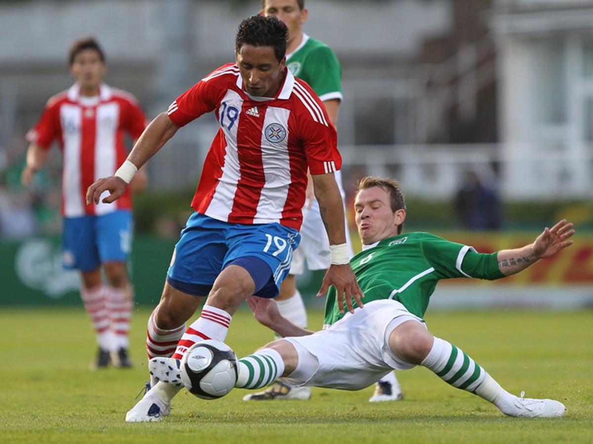 Lucas Barrios a Glenn Whelan