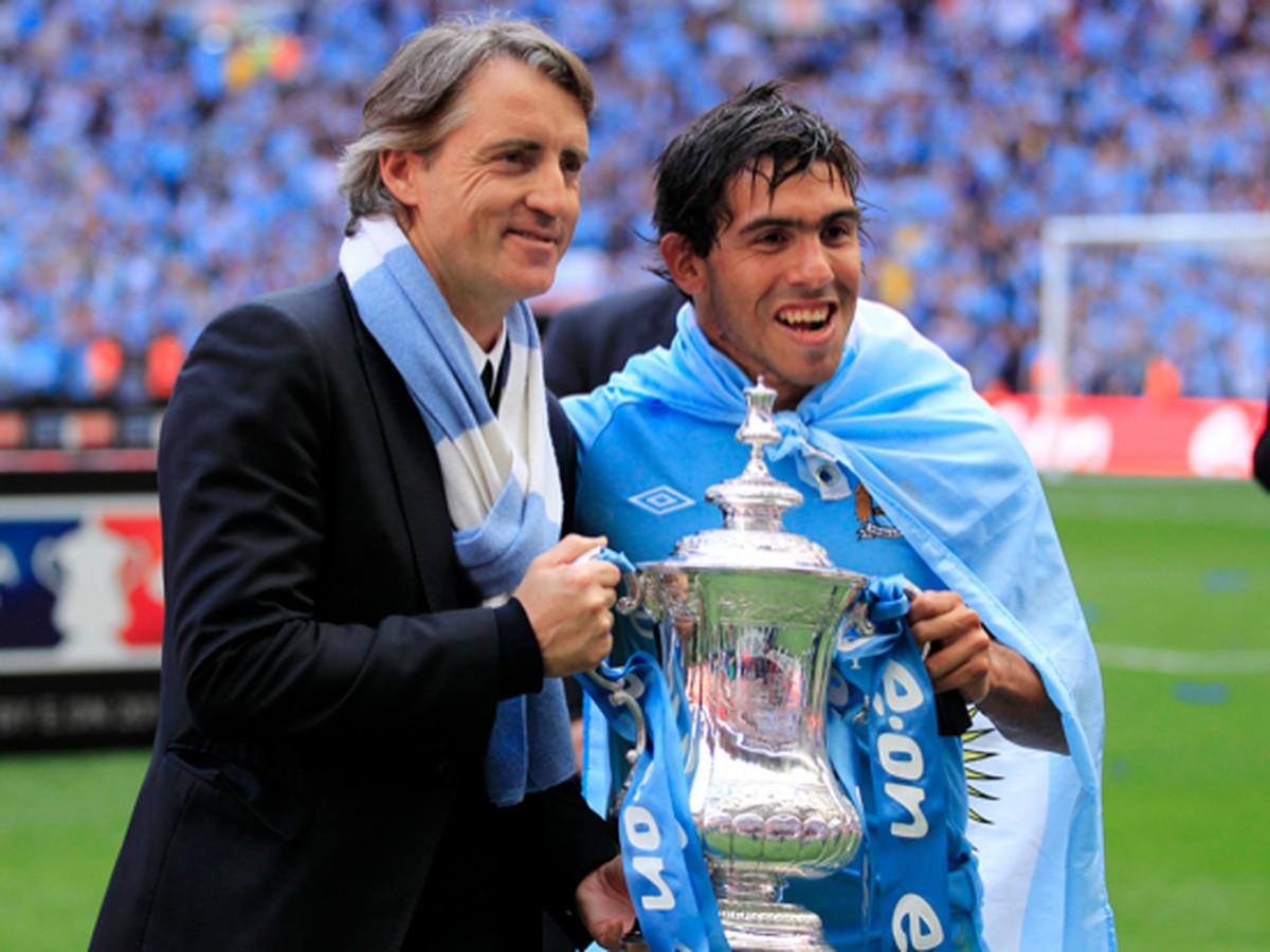 Roberto Mancini a Carlos Tevez