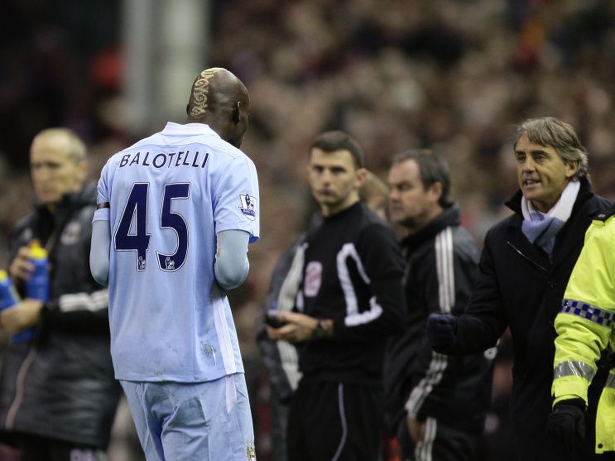 Mario Balotelli a Roberto Mancini