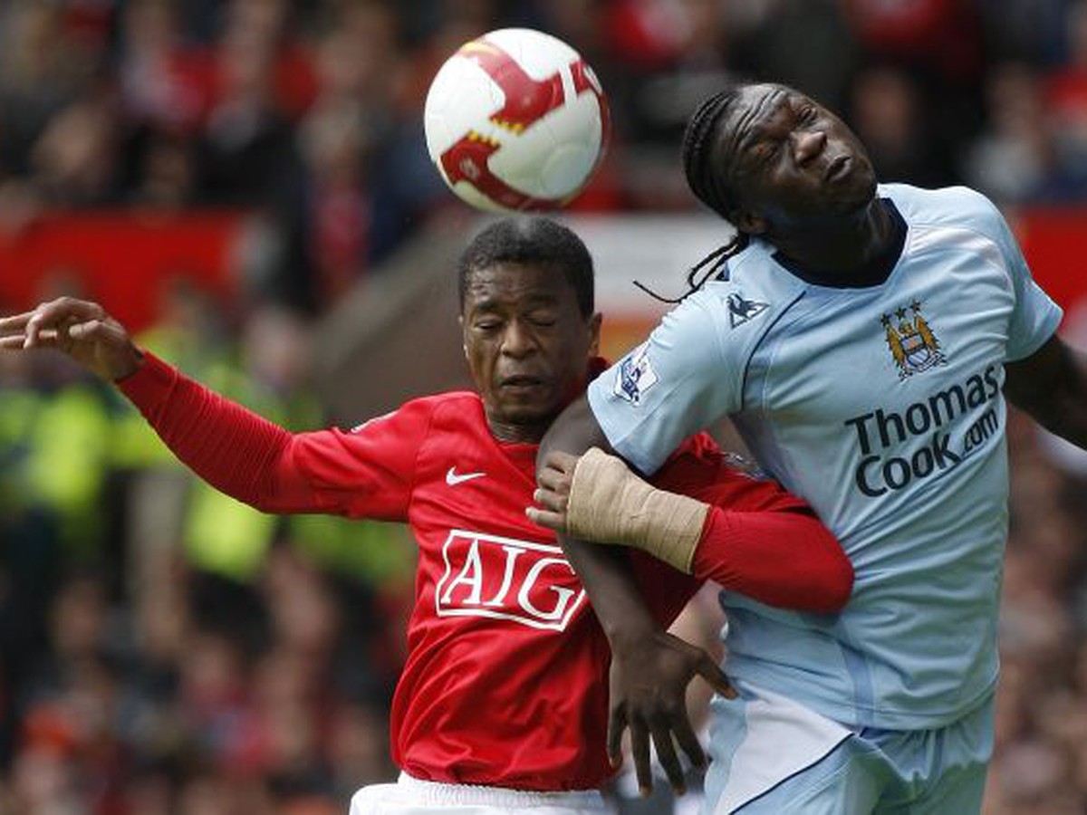 Patrice Evra v súboji s Caceidom