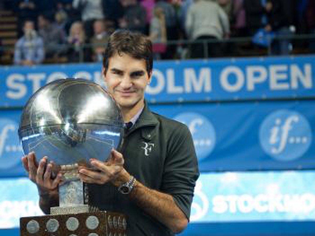 Roger Federer s trofejou