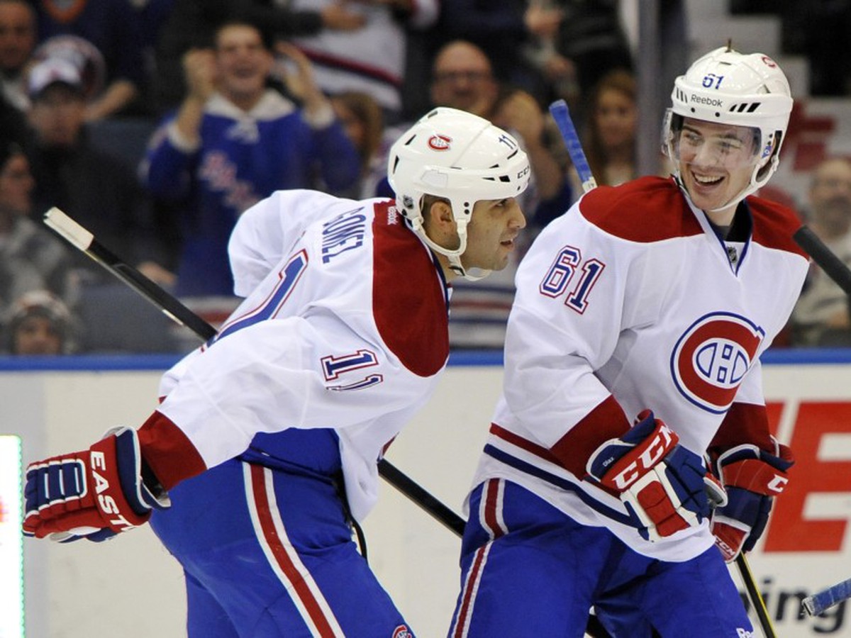 Scott Gomez a Raphael Diaz