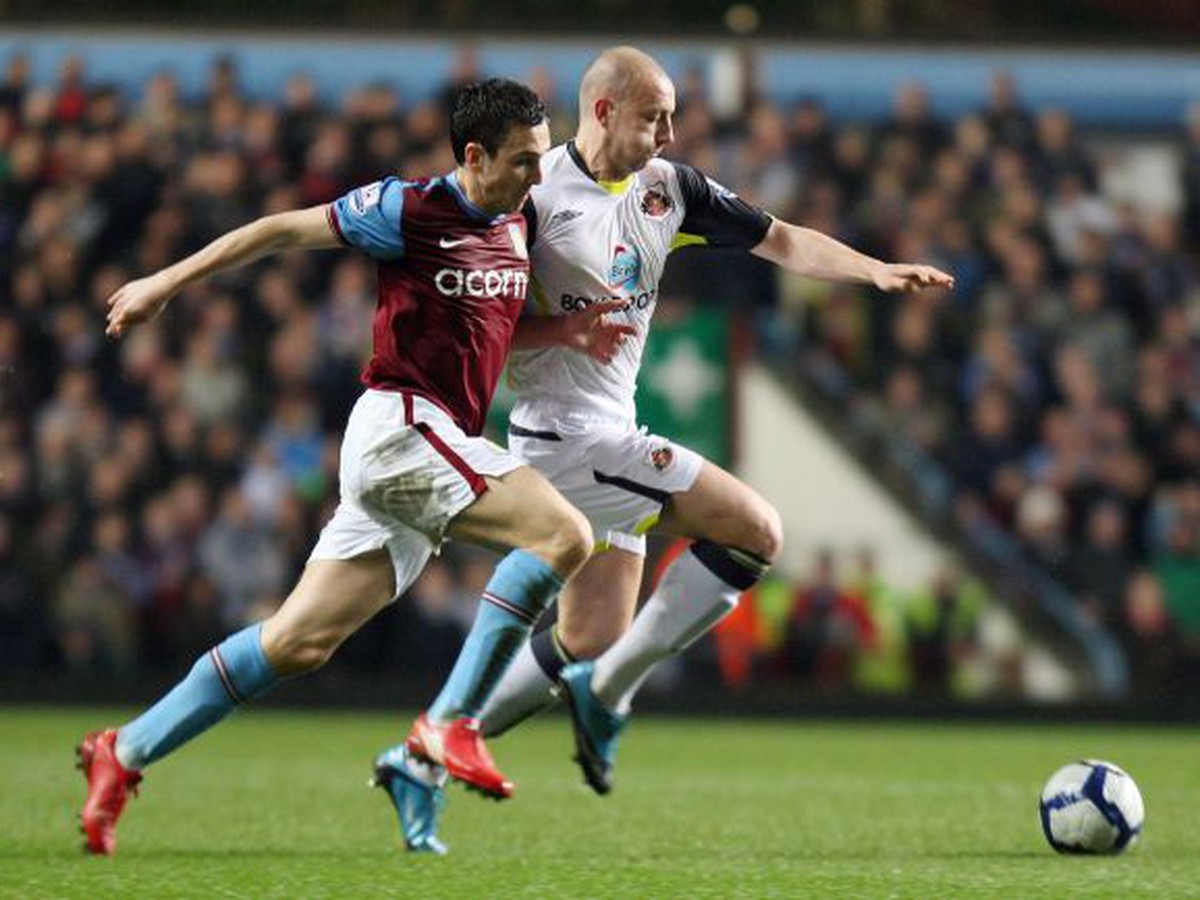 Stuart Downing a Alan Hutton