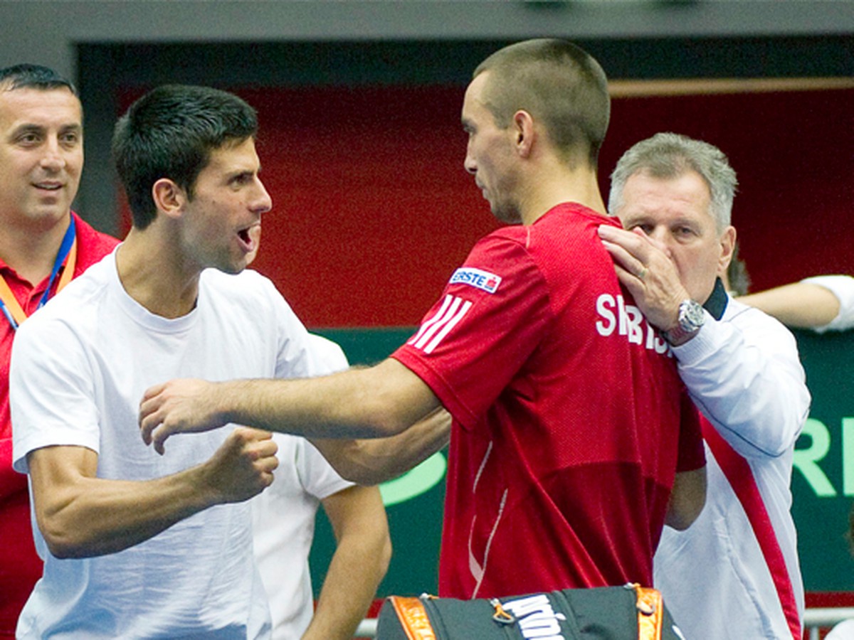 Viktor Troicki a Novak Djokovič sa tešia z víťazstva
