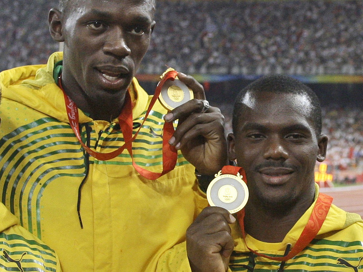 Usain Bolt a Nesta Carter 