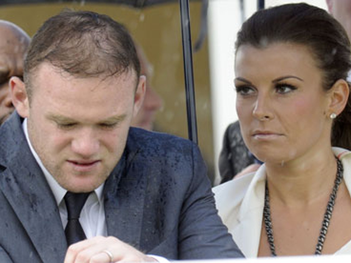 Smutný Wayne Rooney s manželkou Coleen