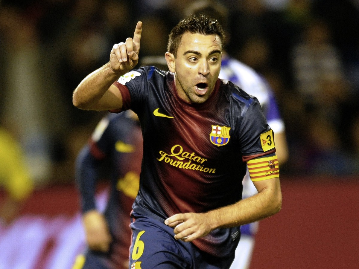 Xavi oslavuje svoj gól do siete Valladolidu