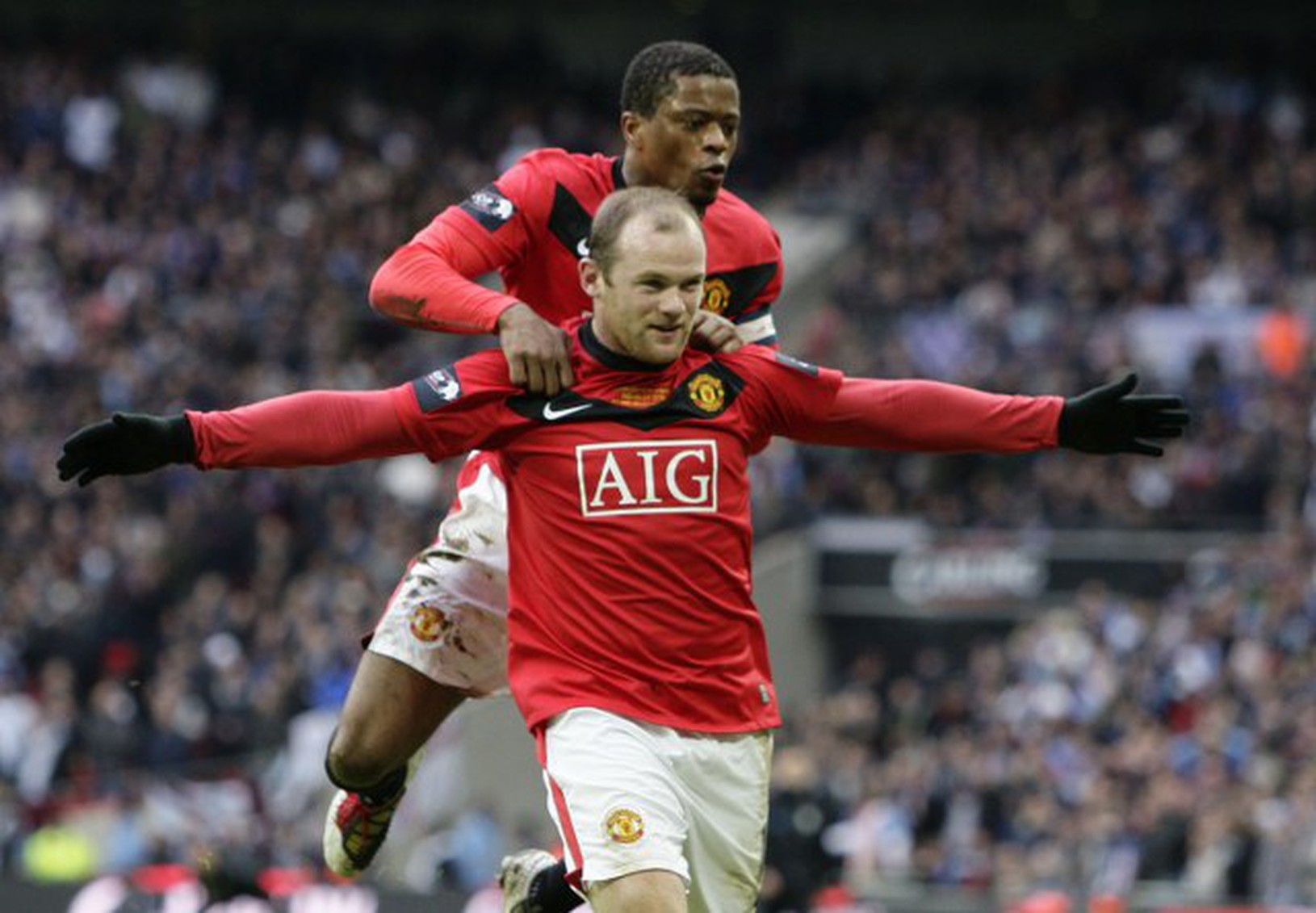 Wayne Rooney a Patrice