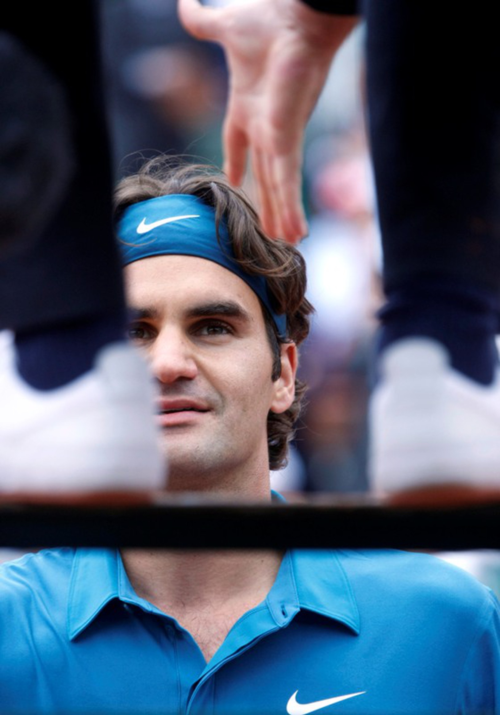Roger Federer hladko postúpil