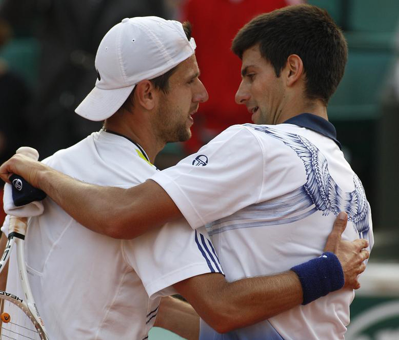 Melzer a Djokovič po