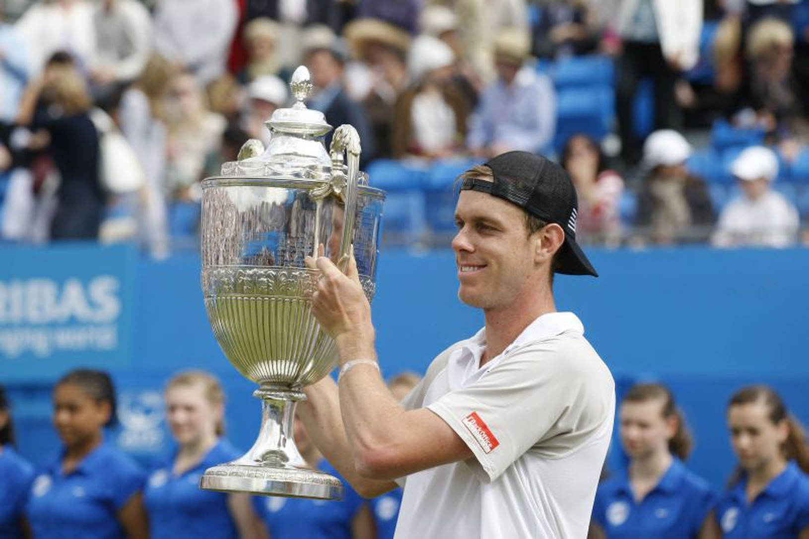 Sam Querrey s trofejou