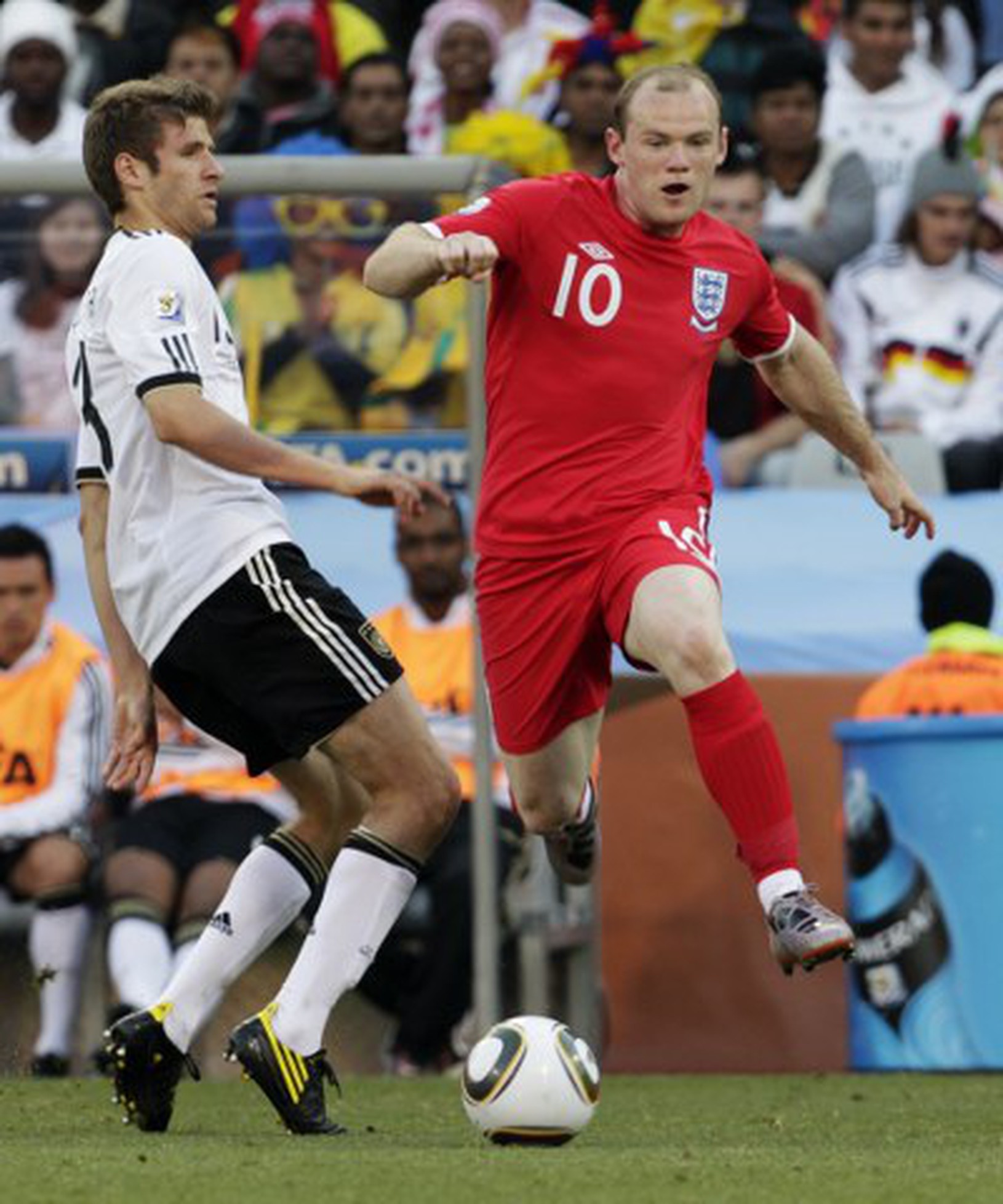Mueller a Rooney v