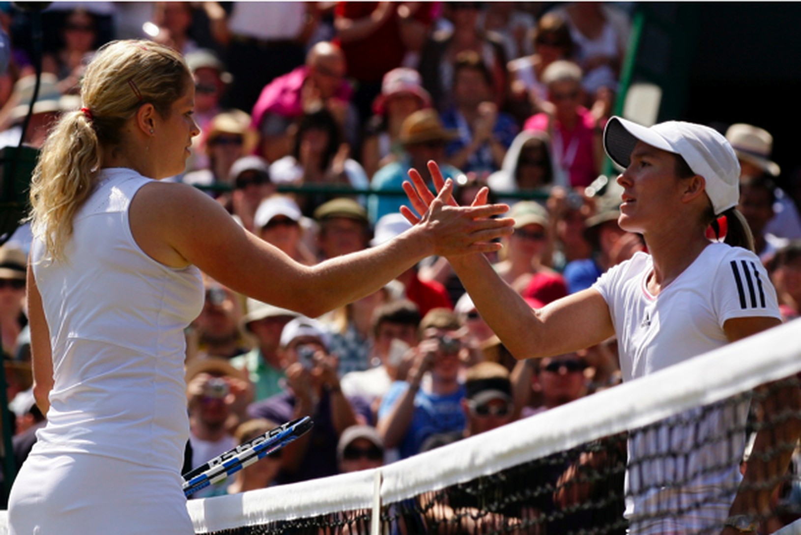 Kim Clijstersová a Justine
