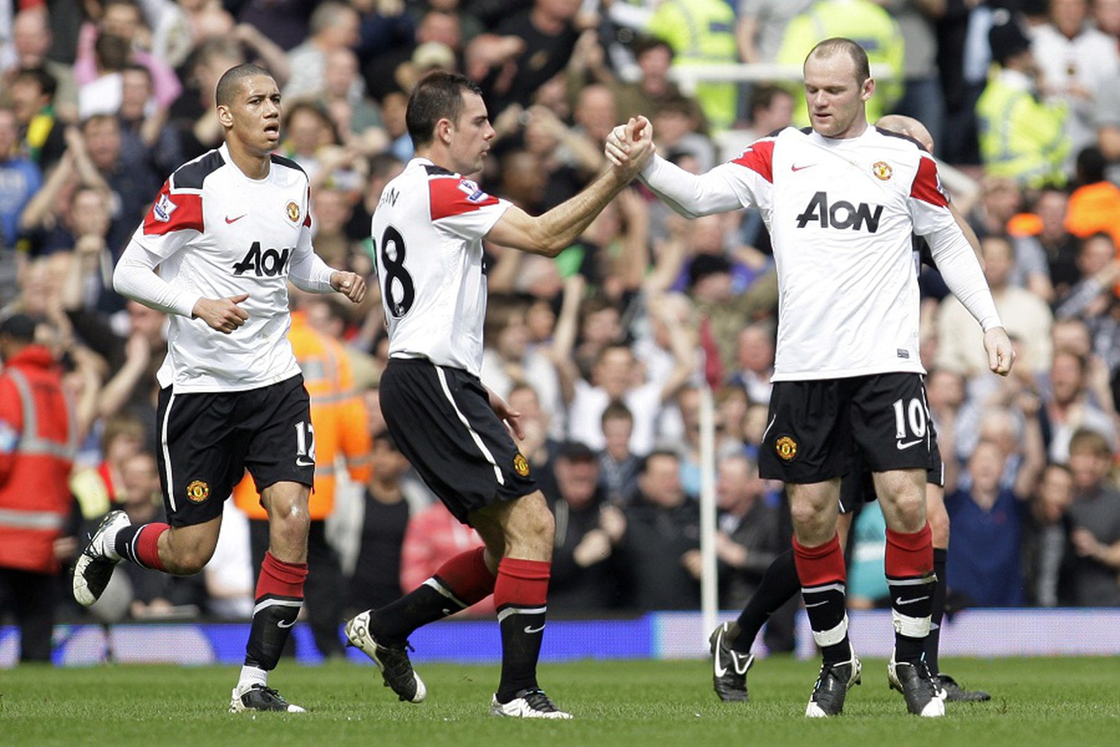 Rooney so spoluhráčmi Gibsonom