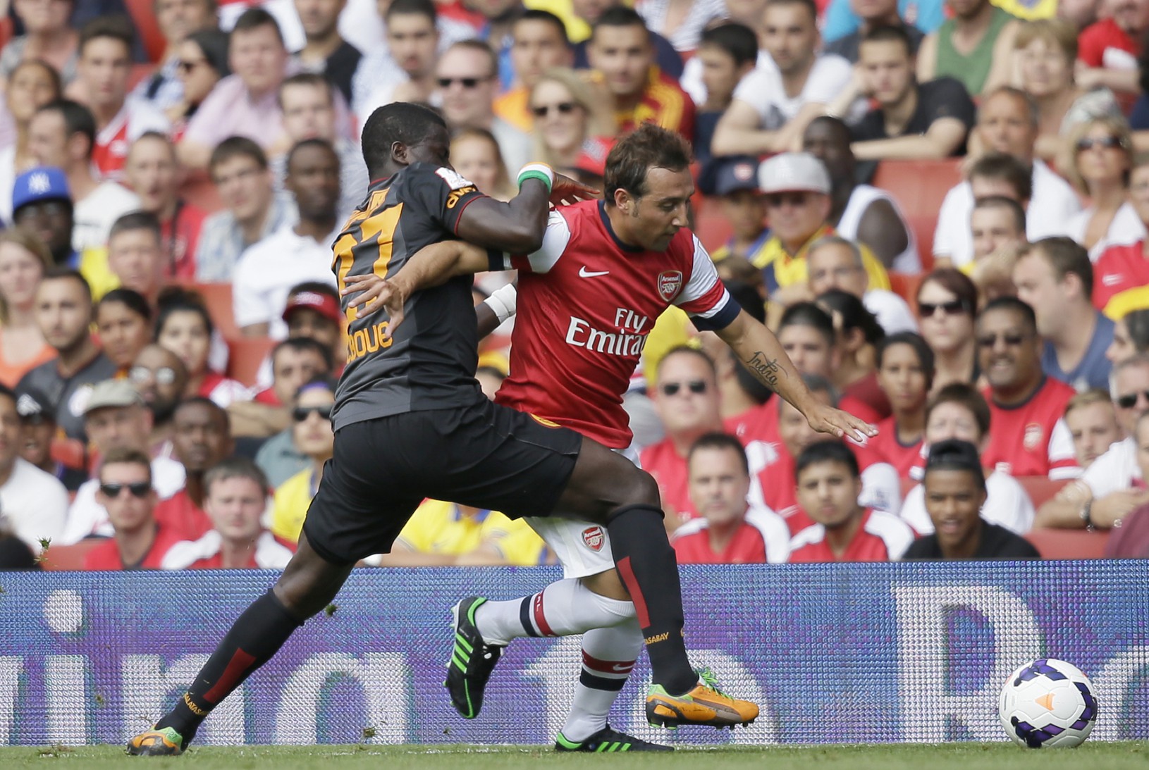 Santi Cazorla a Emmanuel