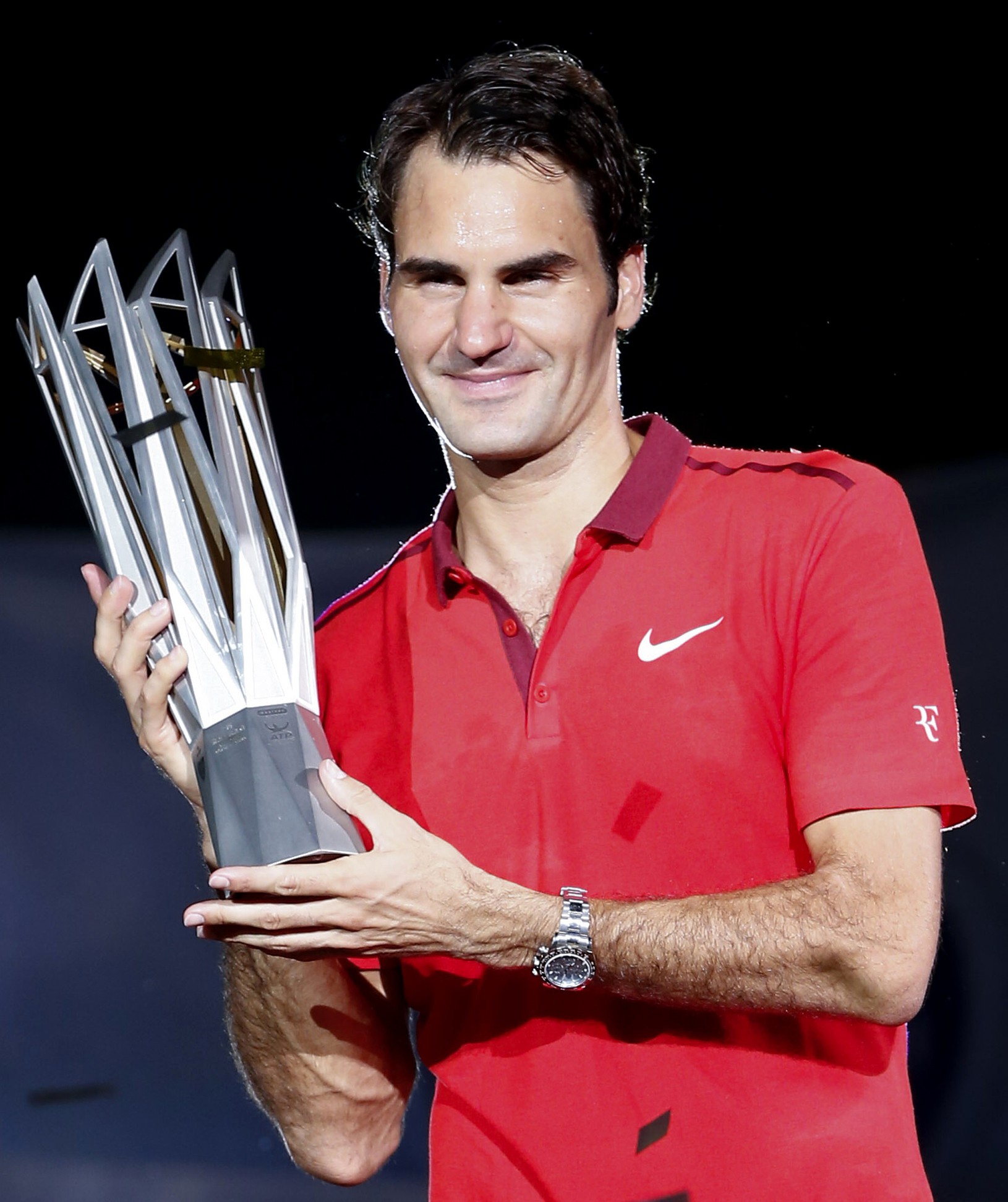 Roger Federer s trofejou