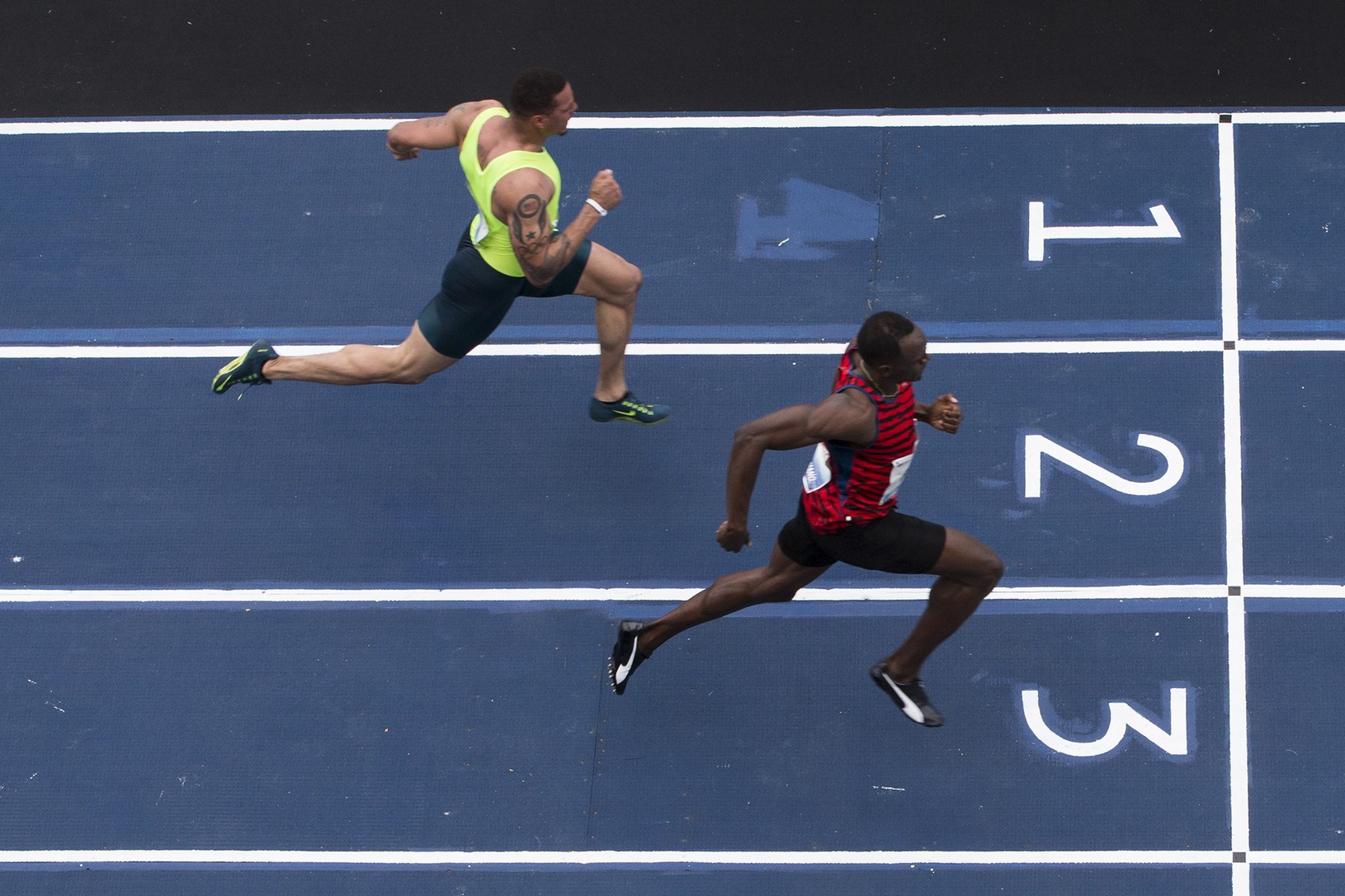 Usain Bolt (vpravo) aj