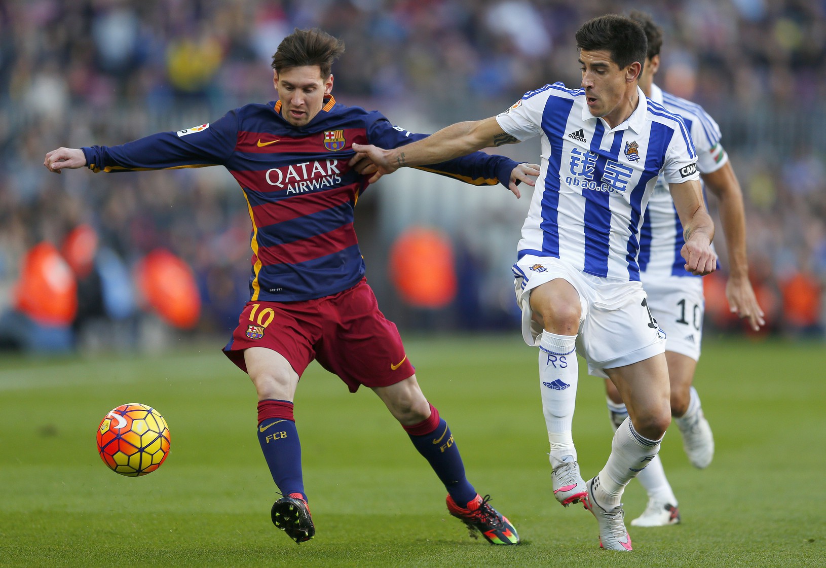 Lionel Messi (vľavo) v
