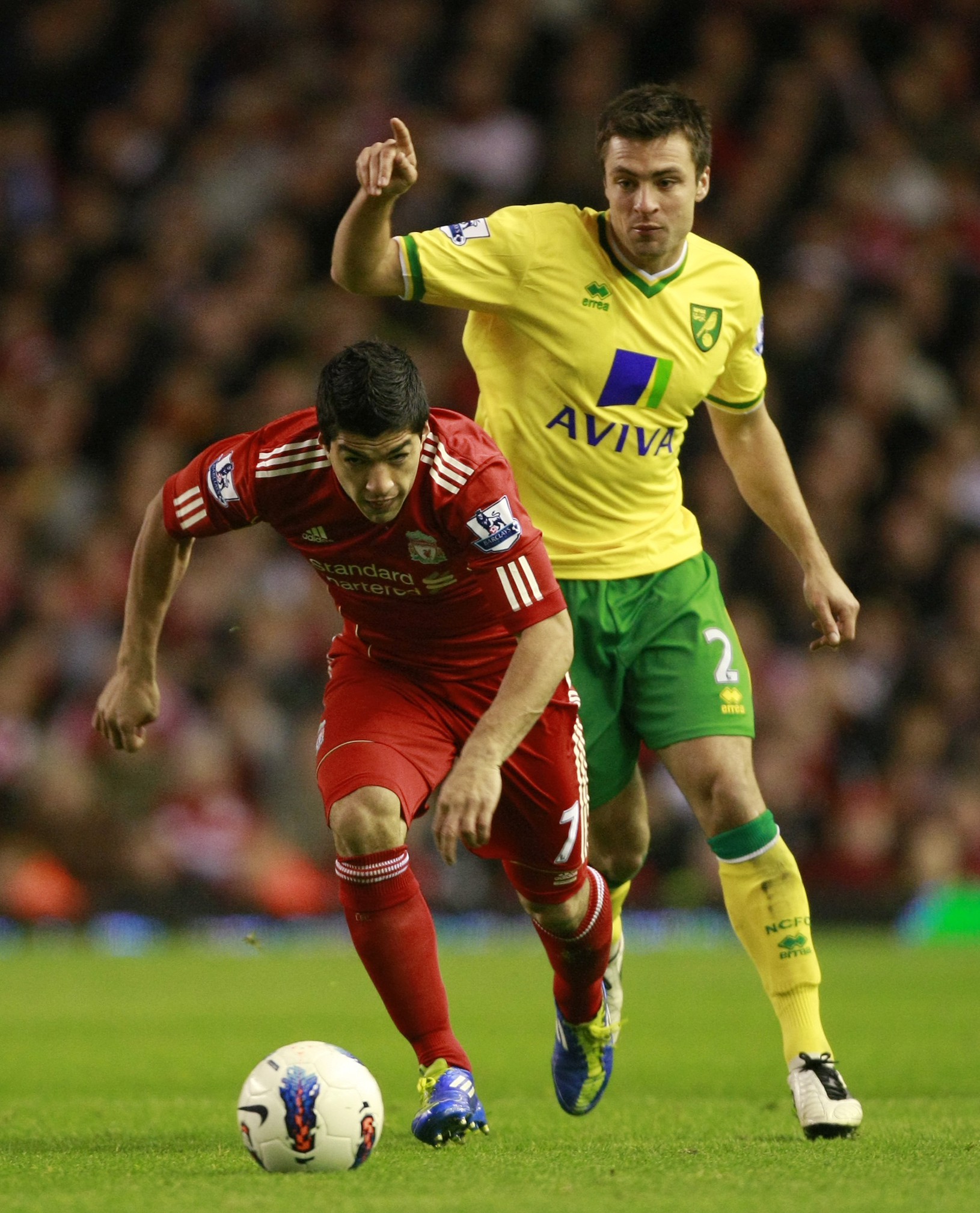 Luis Suarez a Russell