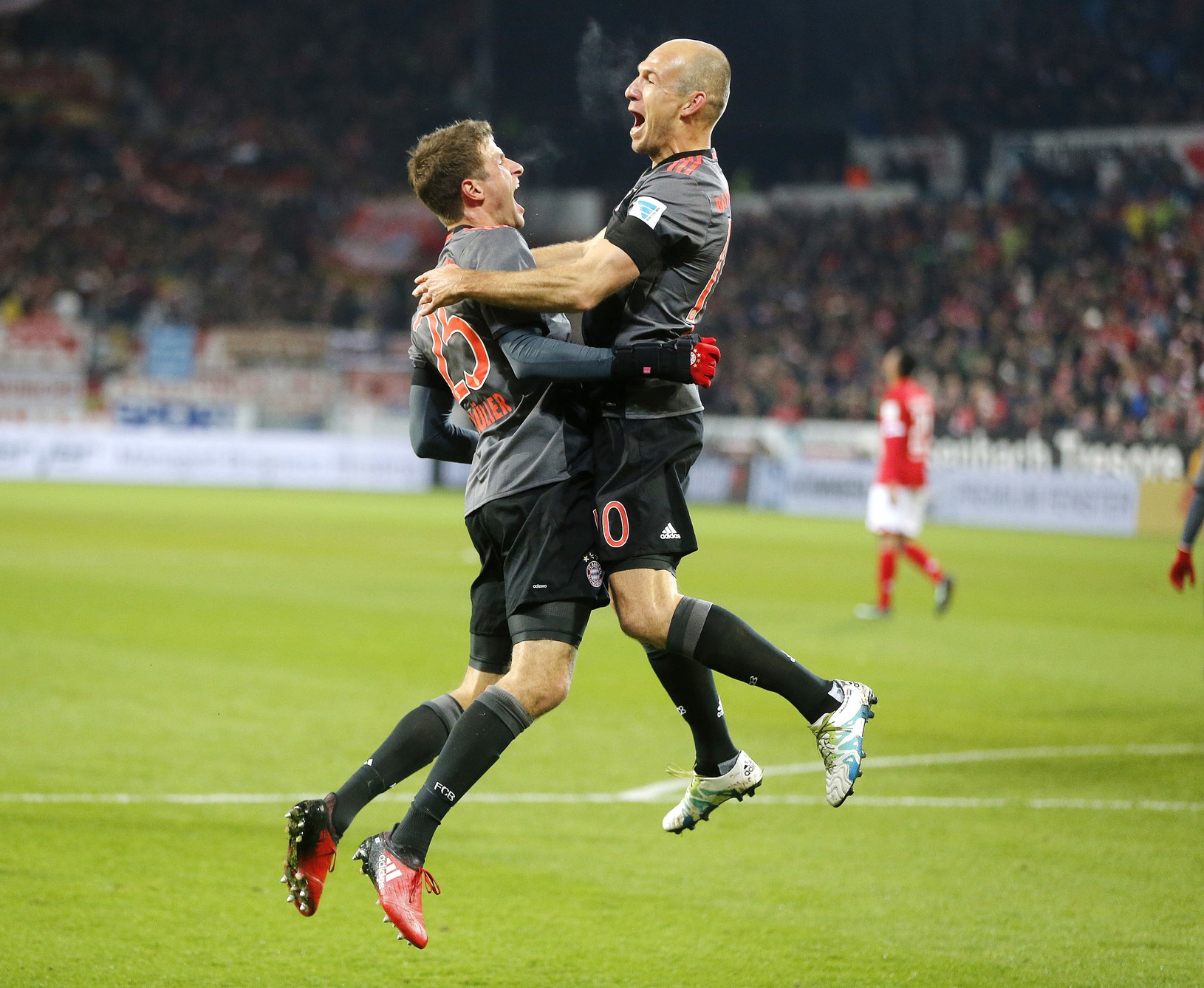 Arjen Robben a Thomas