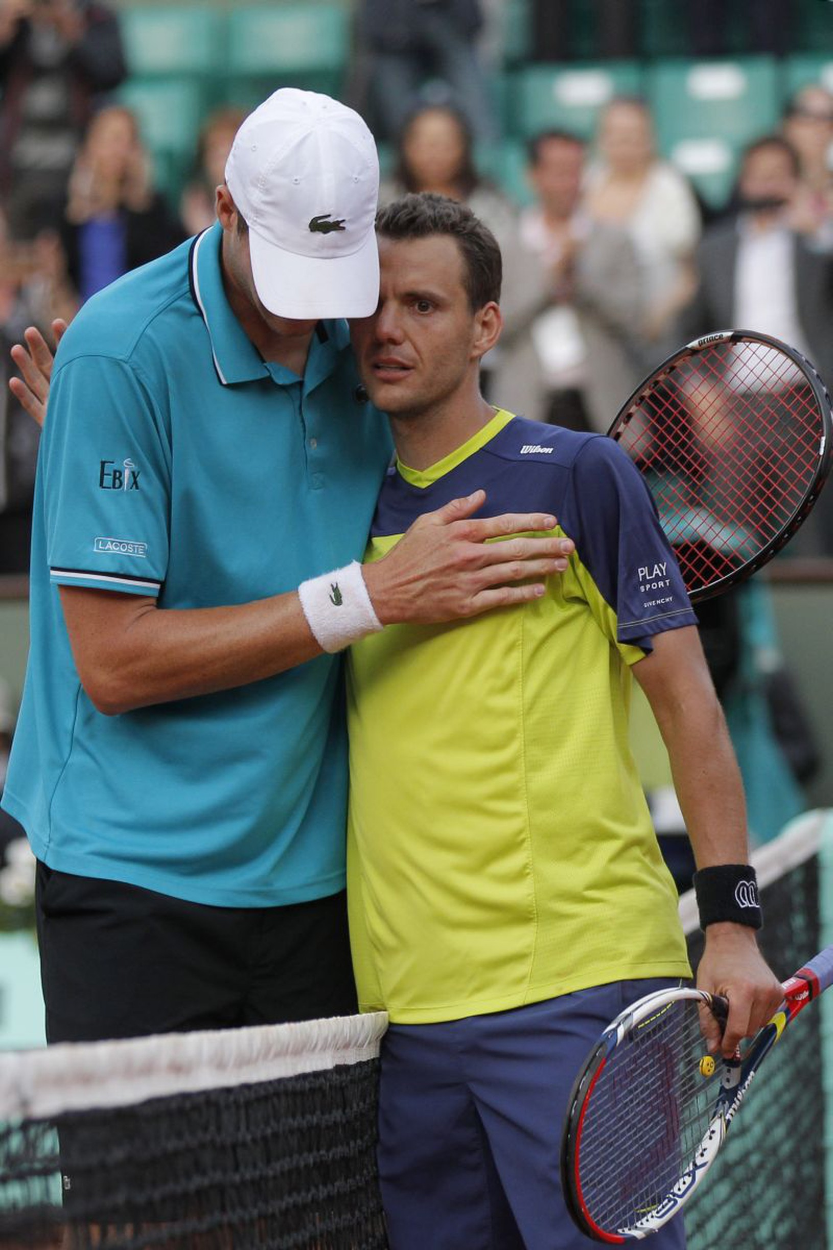 John Isner a Paul-Henri