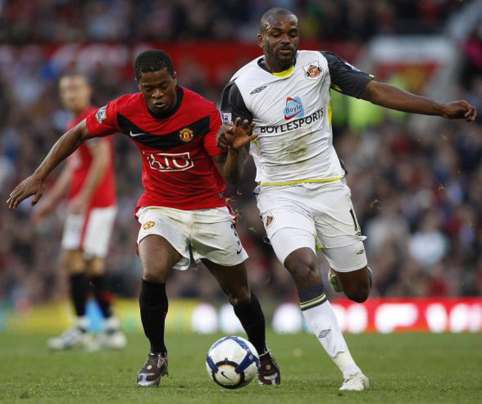 Patrice Evra a Darren