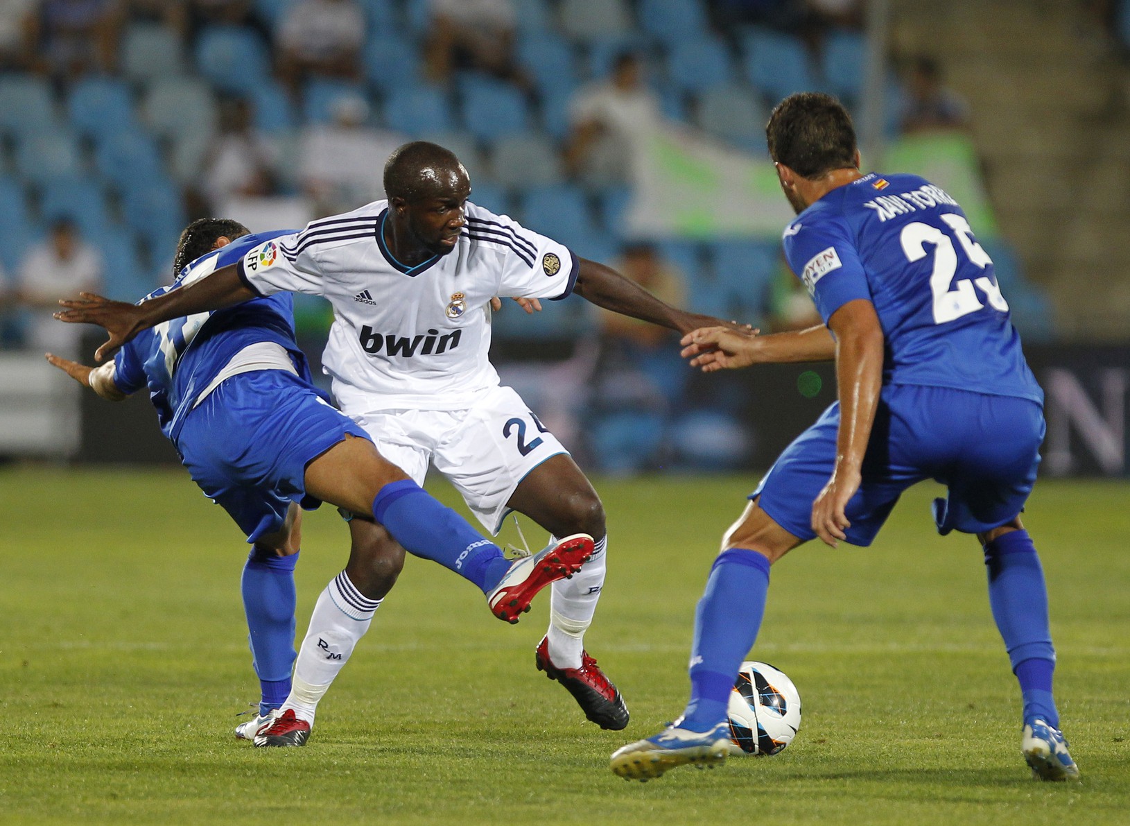 Lassana Diarra, Xavi Torres