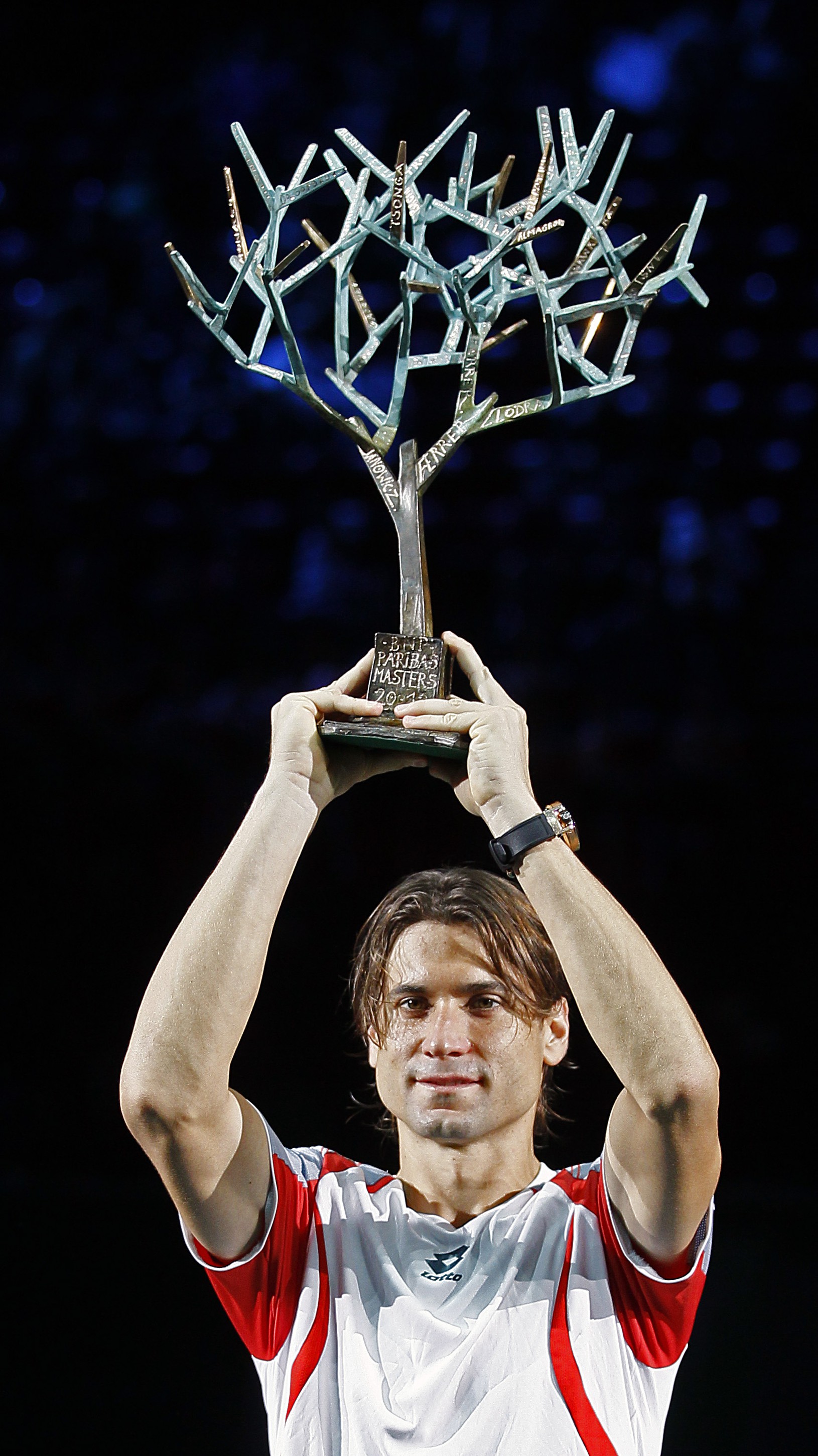David Ferrer s trofejou