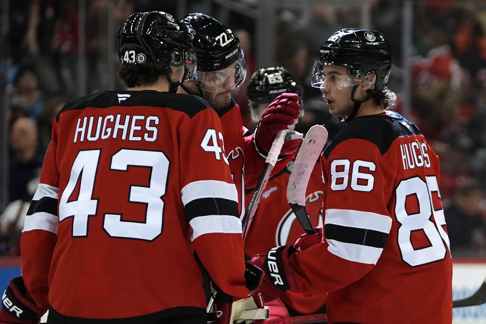 Luke Hughes, Brett Pesce,