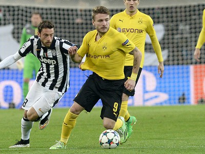 Ciro Immobile a Claudio Marchisio v súboji o loptu