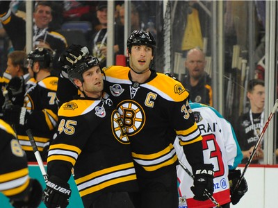 Zdeno Chára a Mark Stuart