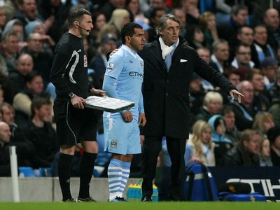 Carlos Tévez a Roberto